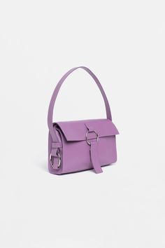 Our bestseller, the SHOULDER BAG in soothing lavender, may potentially become your beloved accessory of this season. 
This bag is ideal for an everyday occasion, with enough room for all your essentials. Purple Rectangular Baguette Bag For Everyday Use, Modern Purple Bag With Detachable Strap, Chic Purple Box Bag For Everyday Use, Lavender Shoulder Bag With Adjustable Strap For Travel, Modern Purple Bags For Everyday Use, Chic Purple Top Handle Box Bag, Modern Purple Bag For Everyday Use, Trendy Lavender Rectangular Shoulder Bag, Chic Lavender Rectangular Shoulder Bag