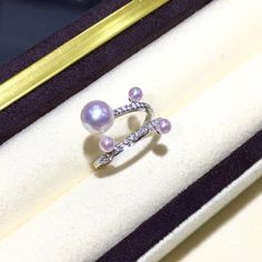 Highline: Famous Style Product Information OriginJapan MaterialAkoya Pearl, 18k Gold, and Diamond Dimensions- Pearl Shaped: Round Size: 3-4 mm & 7-8 mm Quality: AAA Nacre: Very Thick Color: Rose Overton Luster: Very High Accessories Metal: 3.2g of 18k White Gold Other: 0.38ct of SI Quality Natural Diamond Silver Akoya Pearl Ring In Fine Jewelry Style, Elegant Aaa Quality Sterling Silver Rings, White Gold Jewelry With High Luster, White Gold Ring With High Luster, High Luster Diamond Ring Jewelry, White Gold High Luster Ring, High Luster White Gold Ring, White Gold Akoya Pearl Ring As Gift, Silver Aaa Quality Round Diamond Ring