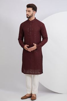 Maroon kurta with thread embroidered floral stripe motifs, embellished by sequins. Comes with a pant. - Aza Fashions Wine Kurta For Men, Reception Long Sleeve Kurta With Multicolor Embroidery, Multicolor Embroidered Long Sleeve Kurta For Reception, Long Sleeve Multicolor Embroidered Kurta For Reception, Sequin Kurta For Eid Reception, Maroon Kurta For Men, Sequined Straight Kurta For Reception, Long Sleeve Sequin Kurta For Reception, Sequin Long Sleeve Kurta For Reception