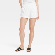 These High-Rise Linen Pull-On Shorts from A New Day™ made from lightweight material in a casual fit make a cool and comfy pick for the sunniest of days. They're designed with a full elastic waist for easy wear, while the side pockets add functional flair. Pair with tucked-in tees and sandals for effortless style. A New Day™: Style that goes wherever you do. Relaxed Bottoms With Built-in Shorts For Summer, Relaxed Spring Bottoms With Built-in Shorts, Warm Weather Cotton Shorts With Elastic Waistband, Cotton Shorts With Elastic Waistband For Warm Weather, Relaxed Fit Cotton Bottoms For Warm Weather, Lightweight Summer Bottoms For Vacation, Casual Beach Bottoms For Warm Weather, Casual Summer Vacation Bottoms, Relaxed Fit Bottoms With Built-in Shorts For Warm Weather