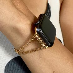 Gold Filled Rope Chain Apple Watch Band - Luxury Women Style Smartwatch Strap Video Of How To Put On Your Bracelet By Yourself Using The Pin https://www.etsy.com/listing/1279637170/instruction-video-of-how-to-put-on-your?ref=share_v4_lx P R O D U C T ∙ D E S C R I P T I O N ∙ 14K Gold Filled Luxury Chain Bracelet For Apple Watch ∙ ∙ Adjustable Size Bracelet Perfectly Tailored for Your Wrist ∙ ∙ Designed And Handmade by Simeon D Jewelry Studio ∙ ∙ This Bracelet Fits ALL Apple Watch Series ∙ ∙ Ple Gold Apple Watch Band With Extender As Gift, Adjustable Gold Watch Band With Solid Link Construction, Elegant Watch Chain Accessories For Gift, Elegant Watch Chain As Gift, Adjustable Gold Metal Apple Watch Band, Gold Metal Apple Watch Band With Extender, Gold Watch Bands With Bracelet Strap For Gift, Adjustable Gold Round Watch Bands, Gold Watch Bands With Bracelet Strap As Gift