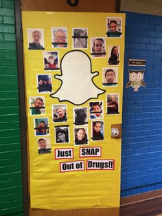 a door decorated with photos and snapchats for children's photo opp