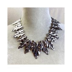 Each silver tone leaf is its own slide style pendant all strung on a silver tone chain  barrel screw clasp Kirks Folly hang tag In excellent condition Kirk's Folly Jewelry, Kirks Folly, Hang Tags, Silver Leaf, Columbus, Charm Necklace, Necklace Etsy, Screw, Barrel