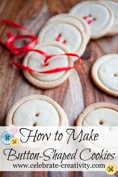 how to make button - shaped cookies on a wooden table with red ribbon around them