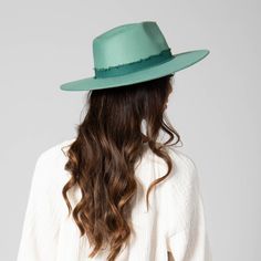 Discover sophistication and elegance with our Women's Faux Felt Fedora. Featuring captivating colors of teal, pink, and white, this iconic fedora is made with 100% polyester. With a brim size of 3.75", it offers optimal sun protection and comes in a flattering one size of 57cm. This Faux felt fedora features a tonal frayed cotton band detail. Embrace luxury and style with our stunning UPF 50 fedora, perfect for any occasion. Features: Color: Teal, Pink, WhiteMaterial: 100% PolyesterBrim Size: 3. Green Hat Bands For Kentucky Derby, Adjustable Green Fedora Felt Hat, Adjustable Green Flat Brim Fedora, Green Short Brim Felt Hat For Summer, Summer Green Felt Hat With Short Brim, Green Adjustable Wide Brim Fedora, Adjustable Green Wide Brim Fedora, Green Fedora For Kentucky Derby, Adjustable Green Felt Hat For Summer