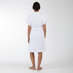 Our Terry Robe is a breezy loungewear essential that combines comfort and style. Crafted from plush cotton terry and trimmed with charming seersucker, this robe is designed to hit above the knee, offering a flattering and versatile silhouette. The cap-sleeve kimono style enhances its lightweight feel, making it ideal for summer or year-round use. Material: Terry CottonSize & Fit: Runs generous, If in between sizes, size down.Care guide: Machine wash cold with like colors. Hang to dry. The model White Relaxed Fit Daywear Robe, Casual Relaxed Fit Robe For Loungewear, Casual Robe With Relaxed Fit For Loungewear, Casual Robe For Relaxation, White Cotton Relaxed Fit Robe, Casual Cotton Lounging Robe, Relaxed Fit Cotton Robe For Lounging, Cotton Robe For Lounging With Relaxed Fit, Cotton Robe With Relaxed Fit For Lounging