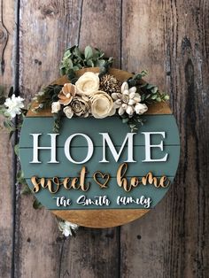 a wooden sign that says home sweet and home