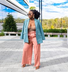 Add some chic vibes to your new season wardrobe. Wide leg trousers are perfect for any outfit a chic touch and we are obsessing over this slinky style. Featuring a high waisted band and soft rusty rose material and a wide leg fit, team them with a crop top or bodysuit and layers of jewelry for a killer look. model wearing medium