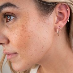 Introducing our 14k Little Diamond Bezel Studs. These studs are perfect for a subtle statement in your lobe or cartilage piercing. 14K Solid Gold and ethically-sourced Genuine Diamonds .10 CTW S12 Clarity, GH Color Available as a single or pair. Model wearing a single bezel stud in her cartilage. Cartilage Piercing, Bezel Diamond, Diamond White, Solid Gold, Diamond Earrings, Jewelry Making, Diamonds, Gold, Color