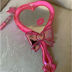 Sugar Thrillz Heart Shaped Handheld Beauty Mirror Crossbody Shoulder Bag Purse Brand New With Tags Limited Edition Pink Vegan Leather Top Zipper Closure Sparkly Lipstick & Star Charms Zipper Pull Holographic Details & Silver Sparkly Stars Bow Shape On Handle One Side Has A Mirror To Check Your Look & Other Side Has Brat Graphics 14” H Detachable Shoulder Strap Comes With Dust Bag All My Items Are Guaranteed Authentic Smoke Free Home Sparkly Lipstick, Heart Shaped Purse, Sparkly Purse, Mcbling Fashion, Mirror Accessories, Heart Mirror, Beauty Mirror, Sugar Thrillz, Pink Mirror