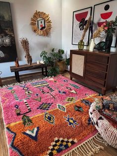 Elevate your space with the vibrant hues of this Pink & Orange Moroccan Rug. Handcrafted with intricate patterns, it adds a touch of exotic charm to any room. Perfect for those who love bold colors and timeless craftsmanship! #MoroccanRug #HomeDecor #InteriorDesign #PinkRug #OrangeRug #BohemianDecor #HandmadeRug #VintageRug #MoroccanStyle #LivingRoomDecor Rug In Kitchen Ideas, Vs Bedroom, Pink Rug Living Room, Townhouse Decor, Moroccan Rug Living Room, Pink Boho Rug, Pink Moroccan Rug, Ett Hem, Vibrant Rugs