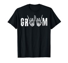 a black t - shirt with the word grom written in white ink on it