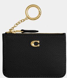 From COACH&#x2C; the Pebbled Leather Mini Skinny ID Case features:Polished pebble leatherCredit card slot and ID windowZip-top closure&#x2C; fabric liningAttached split key ringApprox. 4.25'' L x 3'' HImported. Classic Gold Leather Card Holder, Luxury Coach Card Holder With Card Slots, Luxury Coach Coin Purse With Card Slots, Classic Coach Leather Coin Purse, Elegant Coach Leather Card Holder, Elegant Gold Coach Coin Purse, Coach Leather Card Holder, Coach Leather Coin Purse With Coin Pocket, Classic Formal Coin Purse With Interior Key Chain Holder