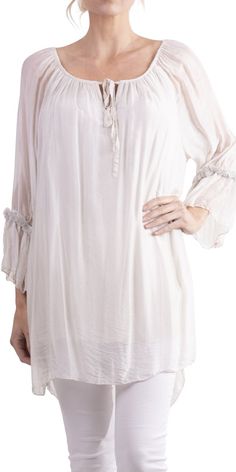 Long, stunning blouse/tunic with front tie and silver detail on sleeve. Can be worn off-shoulder or up. 30% silk, 70% viscose. One Size Fits All. Made in Italy. Spring Silk Off-shoulder Blouse, Off-shoulder Silk Blouse For Spring, Summer Tops With Gathered Sleeves, Flowy Fit, Elegant Silk Off-shoulder Blouse, Summer Flowy Top With Gathered Sleeves, Summer Tops With Gathered Sleeves And Flowy Fit, Summer Viscose Tunic Top, Spring Daywear Blouse With Sheer Sleeves, Elegant Summer Peasant Top With Gathered Sleeves