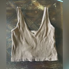 Super Cute Tan Ribbed Tank Top ! Size - M/L No Flaws, Never Used Neutral Tank Tops, Trendy Brown Beach Tank Top, Trendy Ribbed Brown Tank Top, Brown Ribbed Sleeveless Tank Top, Brown Seamless Cami Tank Top, Ribbed Tank Top, Ribbed Tank, Ribbed Tank Tops, Aura