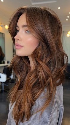 25 Gorgeous Hair Color Ideas to Try This Winter Dimensional Copper Brown Hair, Solid Auburn Hair Color, Lorelai Gilmore Hair Color, Long Brown Hair Ideas, Cedar Brown Hair, Medium Brown Hair With Auburn Highlights, Brown Hair Winter Ideas, Honey Mist Auburn Hair, Copper Hair Gloss