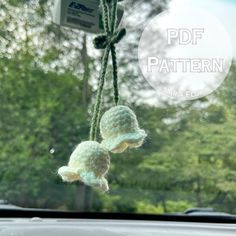 two crocheted stuffed animals hanging from a car's windshield with the words pdf pattern above them