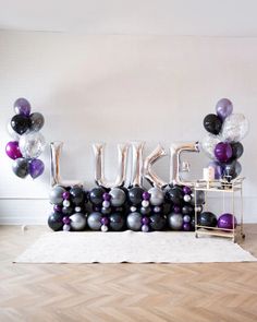 balloons are arranged in the shape of letters that spell out love