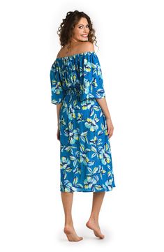 This cover up dress boasts a lively combination of ocean blue and zesty lime green in a vibrant floral print, encapsulating the essence of a tropical paradise. The universally flattering off-the-shoulder silhouette highlights your collarbone. Breezy bell sleeves bring a relaxed, boho vibe, while a gently gathered waist adds definition to your midsection. [split] Details Cover Up Midi Dress Bell Sleeves Elasticized Waist Side Pockets Tassel Cord Detail Fabric 99% Rayon, 1% Lurex