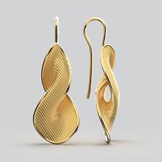 Enhance your style with exquisite elegance wearing our stunning 14K or 18k gold twisted gold drop earrings with hooks, meticulously crafted in Italy. These luxurious earrings feature a captivating design, combining the lustrous beauty of 14K or 18k gold with a unique twisted pattern. Elevate any outfit effortlessly with these Italian-made treasures, as they gracefully dangle from your ears, adding a touch of sophistication and allure. Discover the perfect blend of Italian craftsmanship and timeless style in these enchanting gold drop earrings 14K or 18k gold 45mm long 16mm large designed and crafted in Italy Modern Twist Yellow Gold Earrings With Polished Finish, Modern Twist Polished Yellow Gold Earrings, Elegant Spiral Gold Plated Earrings, Elegant Spiral Earrings As Gift, Modern Twist Polished Earrings For Formal Occasions, Modern Twist 14k Gold Earrings, Modern Twist 14k Gold Formal Earrings, Modern Twist 14k Gold Earrings For Formal Occasions, Elegant Spiral Gold-plated Jewelry