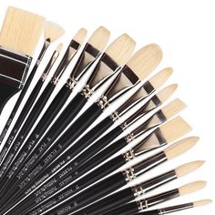 a close up of a bunch of brushes on a white background