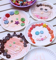 four paper plates with buttons on them