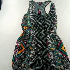 * Women's 2b Bebe * Nwt * Savannah Nights Romper * Scoop Neck * Style 70cyh303o583 * Women's Size Small * Multicolored Savannah Nights Romper * Four Button Closure * Fake Welted Front Pockets * 2 Real Side Pockets * T Back Straps * Psychedelic * Smock Elastic Waist * Two Pocket * 95/5 Polyester/Spandex * Actual Measurements As Follows In Inches * Pit To Pit Laying Flat: 17.5 * Waist: 27 * Inseam: 2.5 * Back Of Neck To Bottom Hem: 33 * Leg Openings:12 * New With Tags * Us Only * Item T 270 Casual Spring Sleep Jumpsuits And Rompers, Cotton Summer Sleep Jumpsuits And Rompers, Multicolor Sleeveless Tops For Loungewear, Casual Jumpsuits And Rompers For Pajama Party, Fitted Multicolor Sleepwear For Vacation, Fitted Casual Jumpsuits And Rompers For Pajama Party, Trendy Multicolor Summer Sleepwear, Multicolor Summer Jumpsuits And Rompers For Loungewear, Summer Multicolor Jumpsuits And Rompers For Loungewear