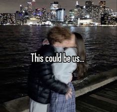 a man and woman kissing in front of a cityscape with the words this could be us