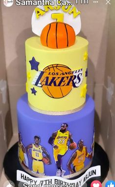 a three tiered cake decorated with photos of basketball players and the words lakers on it