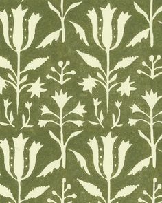 a green and white wallpaper with flowers on it