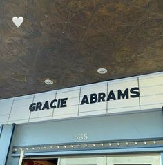 the sign above the door says grace abraham's 535 fifth st, with a heart hanging from the ceiling