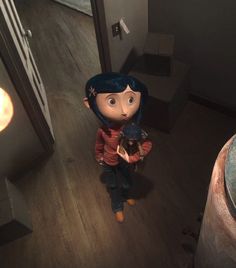 an animated doll is standing in the hallway