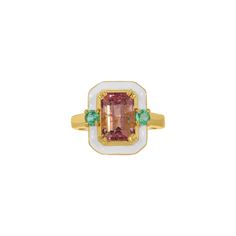 A gorgeous cocktail ring of modern design with a mix of gemstones and enamel. This ring features a beautiful emerald cut Pink Tourmaline center stone set with two round cut fiery Emeralds and glossy white enamel. This ring is set in stylish 22 Karat Gold overlay Silver. Gold Overlay, Enamel Ring, Glossy White, White Enamel, Cocktail Ring, Pink Tourmaline, Stone Settings, Cocktail Rings, Emerald Cut