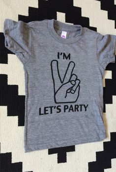 a t - shirt that says i'm let's party on it