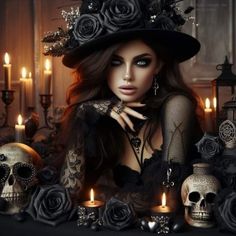 a woman with long hair wearing a black hat next to skulls, candles and roses