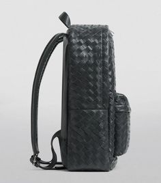 With Bottega Veneta's treasured Intrecciato motif, this luxurious calfskin backpack distinguishes yourself as a savvy fashionista. Crafted using the House's signature weaving technique for sumptuous texture and instant brand recognition without flashy logos. Spacious enough for your daily essentials and tech, it seamlessly accompanies you from meetings to weekendwandering while photographing well for any It bag inspired Instagram posts. An investment as timeless as the Intrecciato pattern itself. Luxury Modern Textured Leather Backpack, Luxury Backpack With Leather Lining, Designer Leather Backpack For Formal Use, Designer Leather Backpack For Formal Occasions, Luxury Backpack For On-the-go, Bottega Veneta Backpack, Textured Leather Backpack For On-the-go, Luxury Leather Backpack With Detachable Handle For On-the-go, Travel Pram