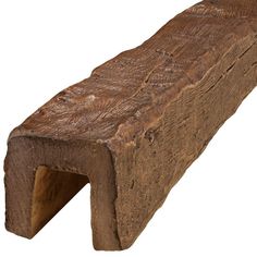 a piece of wood that has been carved into the shape of a long, wooden bench