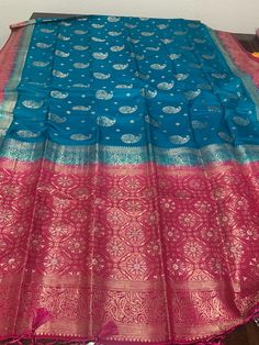 Handmade Khaaddi Banarasi Saree Bondi blue and Rani color Blue Designer Saree For Transitional Season, Designer Blue Saree For Transitional Season, Designer Transitional Blue Saree, Designer Blue Katan Silk Saree, Blue Katan Silk Saree For Eid, Designer Blue Saree With Traditional Patterns, Designer Blue Saree For Eid, Eid Blue Katan Silk Saree, Blue Silk Saree For Diwali