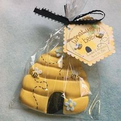 a package of cookies in the shape of a beehive