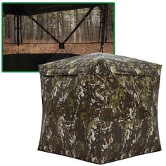 an image of a hunting blind with trees in the background and grass on the ground