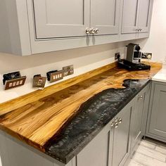 a kitchen counter made out of wood and metal