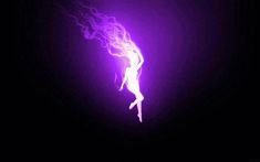 a woman is dancing in the dark with purple light