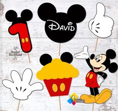 mickey mouse cupcake toppers with the number one on them and some other disney characters