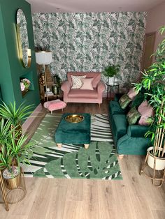 a living room filled with green furniture and lots of plants on top of the floor