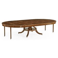 an oval dining table with two leaves on each end