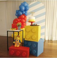 a birthday party with legos and balloons