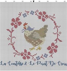 a cross stitch pattern with a rooster in the center