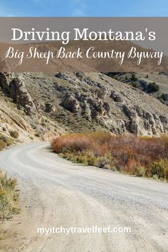 a dirt road with the words driving montana's big shep back country highway