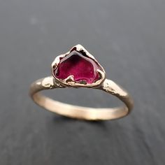 red Garnet (home tumbled). I hand carved this setting in wax and cast it in recycled solid 14k Yellow gold using the lost wax casting process. This one-of-a-kind gemstone ring is a size 7 it can be resized up or down for you as needed. The stone measures about 8.5x5.5mm. Throughout all time and history in every tribe and culture all around the world crystals, minerals and gemstones have been used for healing, luck, divination, adornment vibrational medicine and so much more. Garnet is the births Vibrational Medicine, Rough Diamond Ring, Yellow Gold Solitaire, Yellow Gold Diamond Ring, Wax Casting, Rose Gold Pendant, Lost Wax Casting, Minerals And Gemstones, Lost Wax