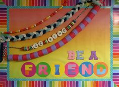 a colorful bulletin board with the words be a friend on it